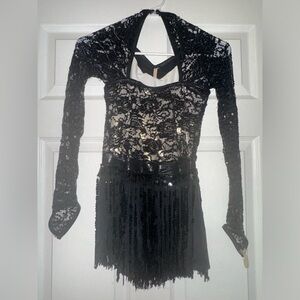 Weissman black fringe dance costumes.